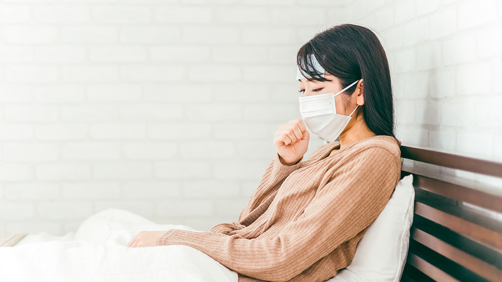 かぜをひいた人の写真